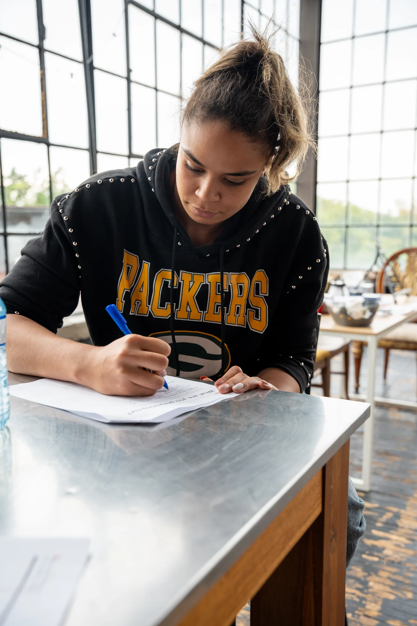 A Creative Longevity participant writing during the Lab