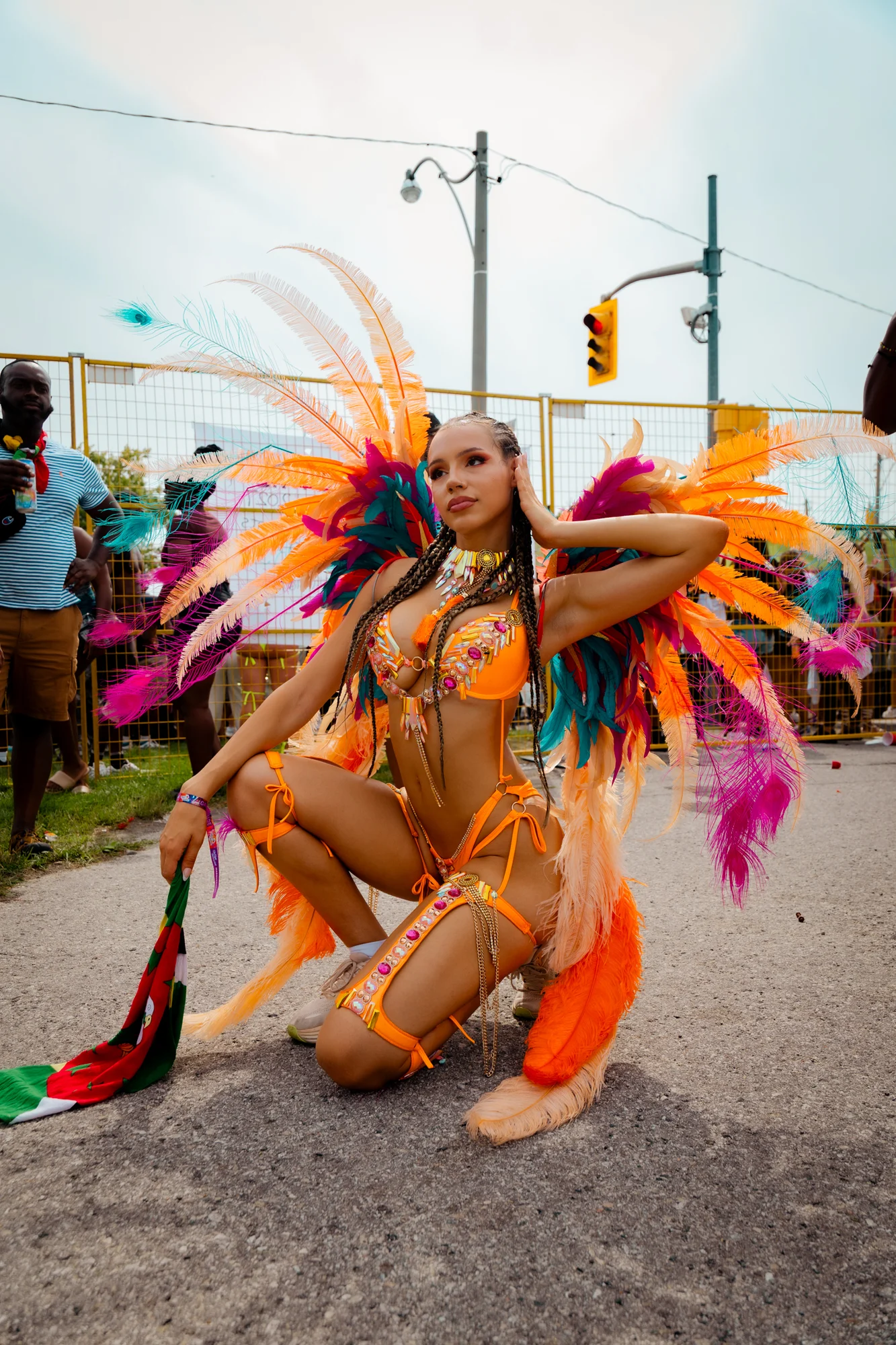 Performer posing in a colourful Carnival costume