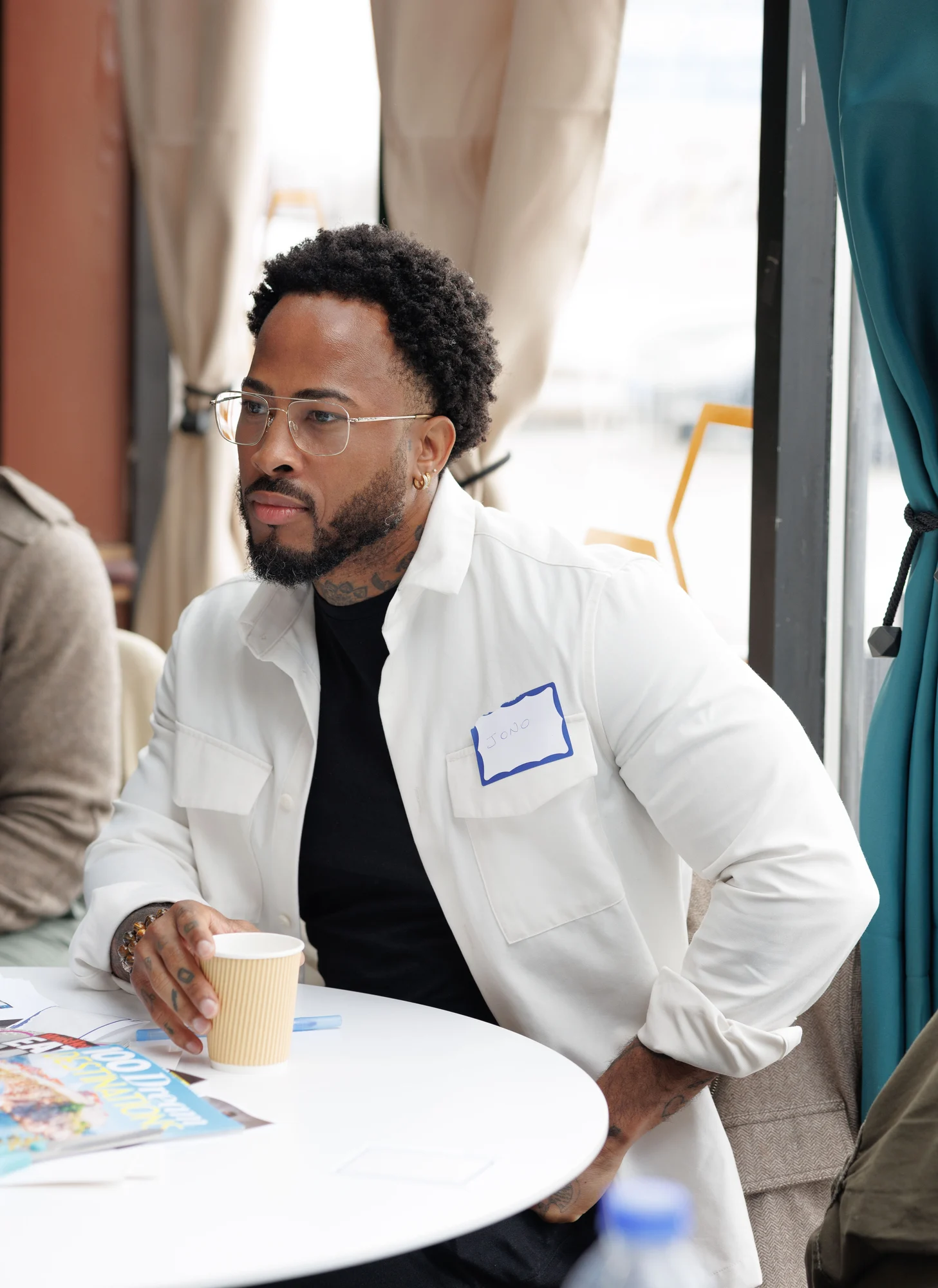 Participant seated in conversation