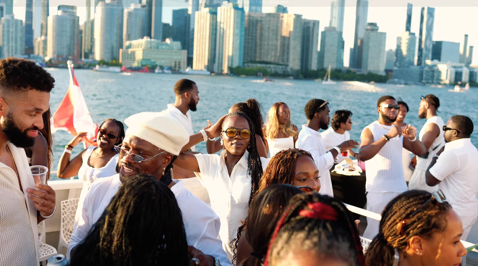 People gathered at the UltraBlack yacht event