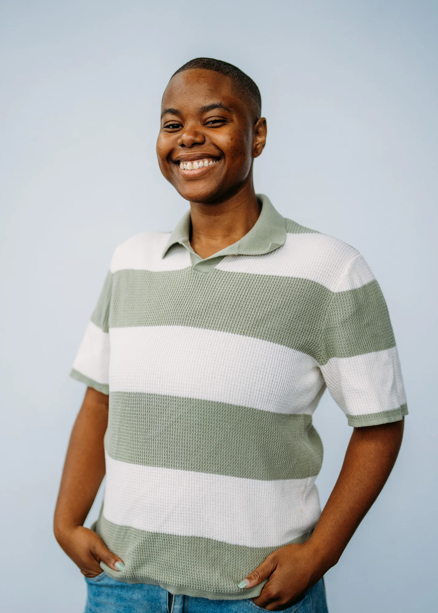 Elisabeth Clarke smiling in a striped shirt