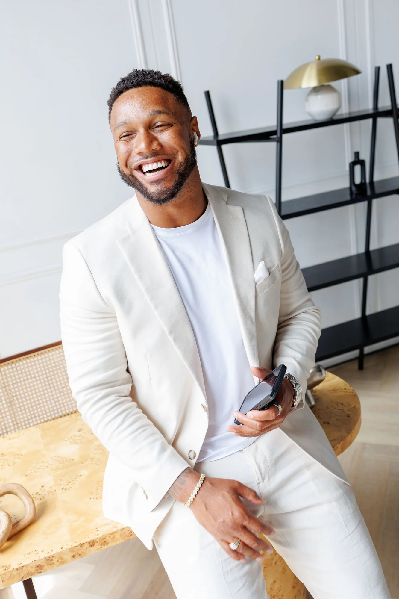 Tychon Carter-Newman smiling in a bright studio